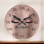Grande Horloge Ronde Rose Gold Glitter Sparkle Eyelashes Monogram Name<br><div class="desc">Rose Gold Faux Foil Metallic Sparkle Glitter Brushed Metal Monogram Name and Initial Eyelashes (Lashes),  Eyelash Extensions and Eyes Blush Pink Decorative Clocks. The design makes the perfect sweet 16 birthday,  wedding,  bridal shower,  anniversary,  baby shower or bachelorette party gift for someone looking for a trendy cool style.</div>