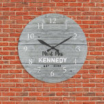 Grande Horloge Ronde Rustic Gray Wood Couple Wedding Anniversary<br><div class="desc">Wedding clocks to personalize with new couple last name. The rustic gray wood background adds a country chic look. Un grand poison pour le weddings et le nouveau foyer.</div>