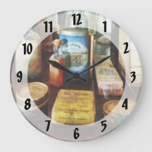 Grande Horloge Ronde Toux et poudre pour dents