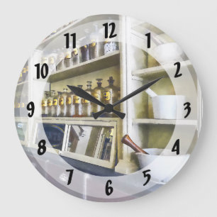 Grande Horloge Ronde Trois mortiers et pilons en pharmacie
