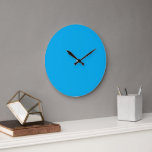 Grande Horloge Ronde Un carré bleu centré sur un arrière - plan blanc,<br><div class="desc">Ce design épuré et minimaliste présente un carré bleu joliment centré sur un arrière - plan blanc immaculé,  ce qui renforce l'impact visuel des couleurs contrastées. Parfait pour ajouter une touche moderne à tout espace.</div>