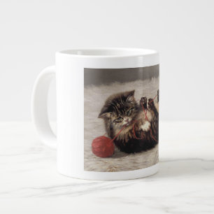 Grande Tasse Berceau de chat, un chat jouant avec une pelote de