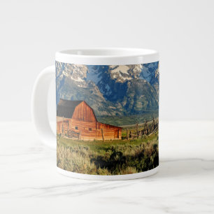 Grande Tasse Farms   Barn Shadowed by Snow Capped Mountains
