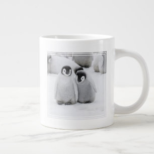 Grande Tasse Manchots Empereurs poussins sur la glace en Antarc