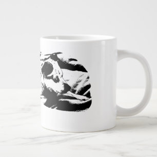Grande Tasse Terrier de garde sur la couverture hivernale