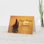 Grandson, une carte d'anniversaire de yacht au cou<br><div class="desc">Envoyez des voeux d'anniversaire avec cette belle carte. Un yacht navigue dans un coucher de soleil doré sur un océan tranquille. Une grande carte pour voilier ou voilier.</div>