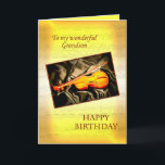 Grandson, une carte d'anniversaire musicale avec u<br><div class="desc">Une carte musicale avec un violon allongé sur la soie. Dans l'arrière - plan est une page de partitions. Voir toute la gamme de cartes pour les âges et les relations dans mon magasin. Toutes les oeuvres d'art copyright Norma Cornes</div>