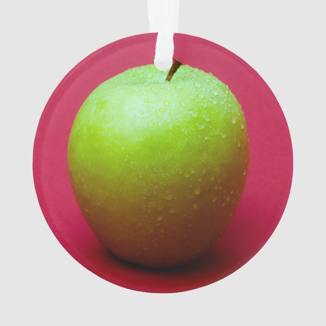 Green apple on red background (dos)