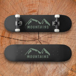 Green Mountains Black Skateboard<br><div class="desc">Un skateboard noir avec des montagnes vertes et du texte personnalisable pour les amateurs de randonnées et d'aventures en plein air!</div>
