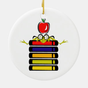 grenouille caricaturale et ornement de livres