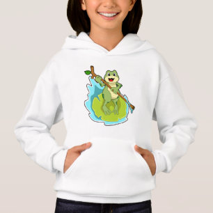 Grenouille comme randonneur avec bâton
