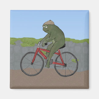 Grenouille gentilhomme sur un aimant à vélo
