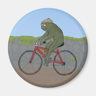 Grenouille gentilhomme sur un aimant à vélo