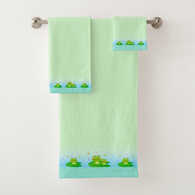 Grenouilles drôles et mignonnes sur serviette de b (En situation)