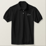 Groom Polo Shirt<br><div class="desc">Chemise Polo Groom en noir avec texte brodé blanc.</div>