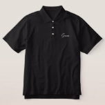 Groom Polo Shirt<br><div class="desc">Chemise Polo Groom en noir avec texte brodé blanc.</div>