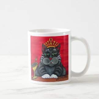 Gros chat avec la tasse de Martini
