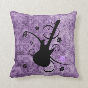Guitare de noir de damassé et coussin grunges