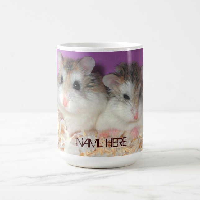Hamsters mignons dans la tasse d'amour avec le nom (Centre)