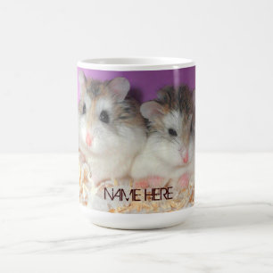 Hamsters mignons dans la tasse d'amour avec le nom