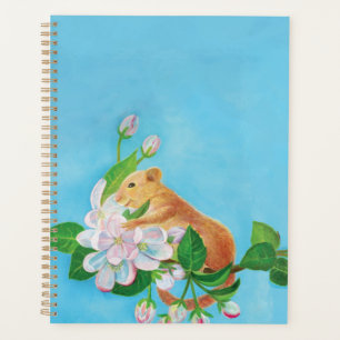 Hazel Dormouse sur une branche fleurie