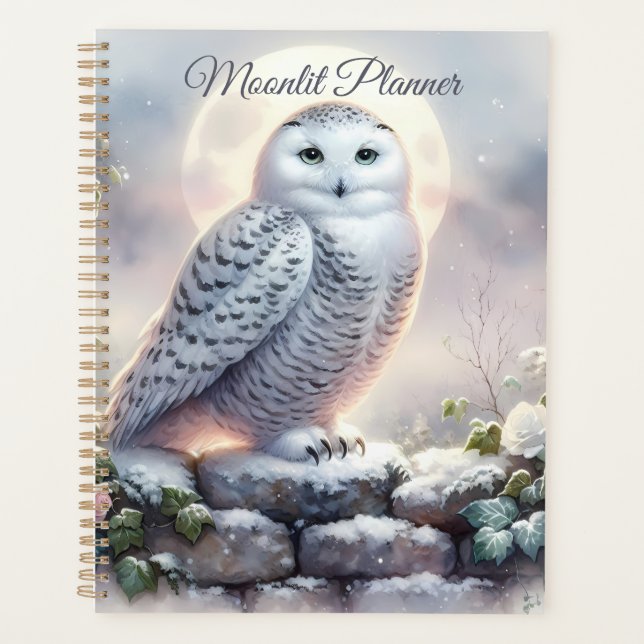 Hibou des neiges dans un jardin d'hiver au clair d (Devant)