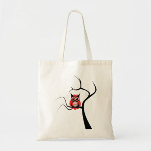 Hibou rouge de crâne de sucre dans le sac d'arbre