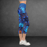 Hippie psychédélique Leggings bleu et orange<br><div class="desc">Ces leggings psychédéliques présentent des bleus et des oranges éclatants dans un motif kaléidoscope asymétrique.</div>