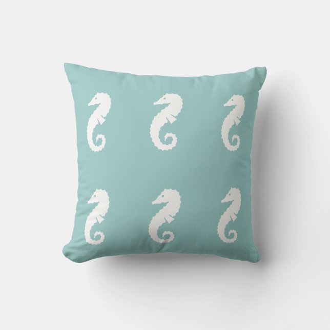 HIPPOCAMPE BLANC CASSE sur un coussin bleu (Recto)