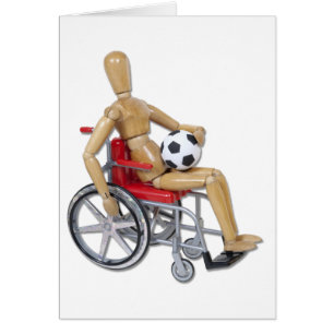 HoldingSoccerBallWheelchair