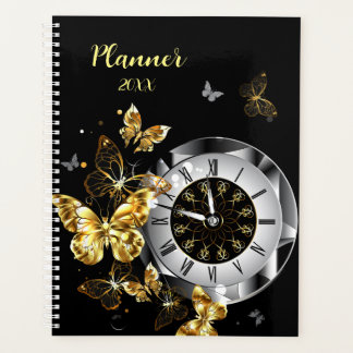 Horloge antique avec planificateur de papillons d'