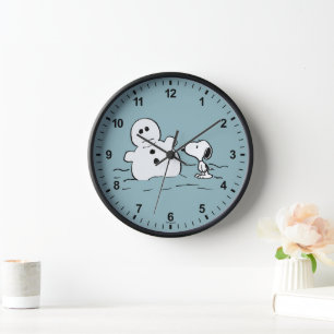 Horloge cacahuètes   Snoopy Construit Un Snowman