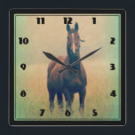 Horloge Carrée Bay Horse Standing<br><div class="desc">A beautiful bay horse wearing a halter standing alone in a grassy honey colored field and background. The photo has been touched up to give a soft misty magical quality with a pastel green border.</div>