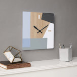 Horloge Carrée Blocs Modernes Art Motif Sur Faux Woodgrain<br><div class="desc">Motif moderne blanc, gris foncé et clair, bleu pastel sur fond de faux bois beige clair. Classic rétro chic, élégant mais simple design de base pour la décoration de maison artistique concepteur de mode, populaire branché, fantaisie de style du milieu du siècle. Disponible sur des accents et accessoires intérieurs originaux,...</div>