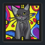 Horloge Carrée Chat d'art pop noir<br><div class="desc">Horloge murale amusante et colorée,  avec des dessins animés comme des graphiques d'un chat noir style pop art. Idée cadeau pour n'importe quel amoureux des chats.</div>
