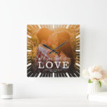 Horloge Carrée Chic Wedding All you need is Love Photo<br><div class="desc">Chic photo throw pillow with script calligraphy and modern typographiy reading:' All you need is Love 'alongside your custom names. Personalize with your favorite photo,  names,  and wedding date. Great vend pour Valentine's Day,  Newlyweds,  ou anniversary.</div>