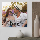 Horloge Carrée Couple Photo Love and Hearts Calligraphy<br><div class="desc">Créez votre propre horloge photo unique. Le modèle photo est configuré pour vous permettre d'ajouter votre propre image qui remplira automatiquement toute la face de l'horloge. Le texte écrit à la main se lit simplement "amour" dans la belle calligraphie avec les coeurs d'amour à chaque extrémité. Vous pouvez customiser ce...</div>