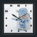 Horloge Carrée Cute Snowman au photographe de Christmas<br><div class="desc">A clock with a cute photograph of a little snowman. Le Standing Outside dans l'Hiver,  sans compter que tout va bien. This cute little guy is dressed up in blue knitted a et scarf.</div>