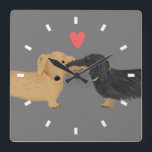 Horloge Carrée Dachshund Baiser avec coeur | Wiener Dogs Love<br><div class="desc">Doxie brun et brun brun brun et Dachshund roux brun avec coeur. Une mignonne horloge murale d’amoureux des chiens vierge pour la maison ou le bureau. Fait un cadeau parfait pour tous les amoureux des animaux de compagnie. Visitez Jenn’s Doodle World pour encore plus de cadeaux d’amoureux Dachsie et de...</div>