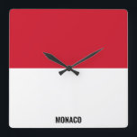 Horloge Carrée Drapeau Monaco Patriotique éblouissant<br><div class="desc">Drapeau Monaco Éblouissant Mur Carré Patriotique Horloge dans les couleurs et les éléments du drapeau national de Monaco couvrant l'avant de l'horloge. Les couleurs du drapeau national sont complétées par le texte "Monaco" en bas. Le texte est entièrement personnalisable à l'aide de la fonction "Customiser !". N'hésitez pas à le...</div>