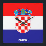 Horloge Carrée Drapeau national de Croatie Patriotique<br><div class="desc">Croatie Drapeau National Carré Patriotique Horloge murale avec le drapeau du pays dans les couleurs nationales imprimé tout au long de la journée. Le nom du pays est subtilement intégré dans la conception du fond. Le texte est entièrement personnalisable en utilisant "Customisez-le !" Caractéristiques. Ce design charmant est le cadeau...</div>