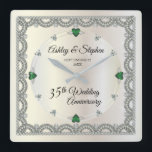 Horloge Carrée Emeralds | Diamonds 35th Wedding Anniversary<br><div class="desc">Opulent elegance frames this 35th wedding anniversary design in a unique scalloped diamond design with diamond and emerald look accents in lieu of numbers and faux added sparkles on a white gold-tone. Please note that all embellishments are printed and are only made to appear as real as possible in a...</div>
