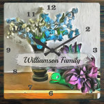 Horloge Carrée Fleurs de soie et de rousseur de maïs 2190<br><div class="desc">Peinture "Fleurs de soie et de corn Husk 2190" Collection Conception créée à partir de ma peinture "Fleurs de soie et de corn Husk 2190" capturant une scène de soie et de fleurs de serres de maïs que j'ai achetée dans un marché à Sayulita, au Mexique. Les produits correspondants sont...</div>