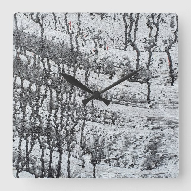 Horloge Carrée goutte de peinture noire sur béton (Recto)