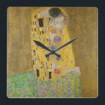 Horloge Carrée Gustav Klimt Le Baiser<br><div class="desc">The Kiss est le tableau le plus emblématique et le plus célèbre de Gustav Klimt. C'est un beau tableau doré d'un couple profondément amoureux partageant un moment romantique d'un baiser passionné. Obtenez vos idées cadeaux de haute qualité et des produits merveilleux avec ce merveilleux chef-d'oeuvre. Consultez notre boutique pour en...</div>
