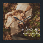 Horloge Carrée I Love Us Couple Quote Photo de Names<br><div class="desc">A beautiful way to celebrate your relationship, this photo acrylic design wall clock feels 'i love us in white lettered script overlay at the bottom right, followed by your names. To personalize, replace with your photo and edit the names field. Acrylic prints are a beautiful way to enjoy your images...</div>