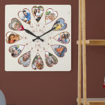 Horloge Carrée Il était une fois 12 Photos en forme de coeur Crèm<br><div class="desc">Créez votre propre horloge multiphoto pour raconter votre histoire - le centre de la face de l'horloge est écrit avec "Il était une fois" en typographie manuscrite. Utilisez le modèle photo pour ajouter 12 de vos photos préférées, qui seront affichées en forme de coeur. La conception utilise des photos verticales...</div>