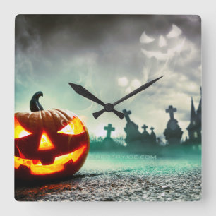 Horloge Carrée La citrouille lumineuse Halloween de SlipperyJoe