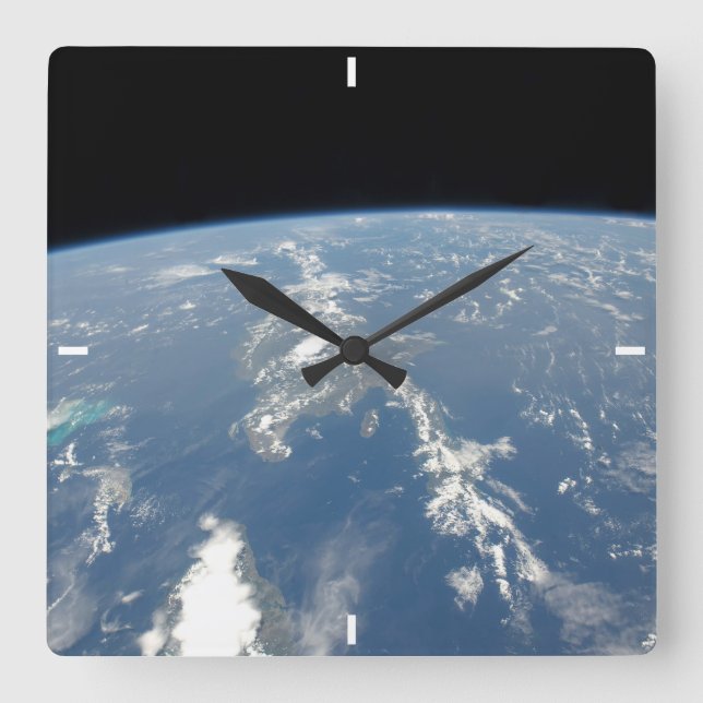 Horloge Carrée La Poussière Saharienne Frappant Vers L'Ouest Dans (Recto)