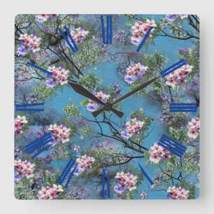 Horloge Carrée Les fleurs du printemps de Jacaranda répètent les 
